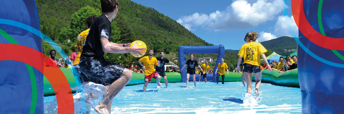 students playing soapy soccer